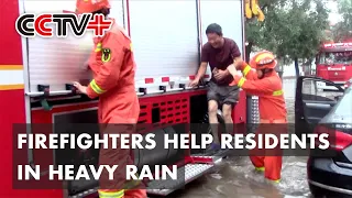 Firefighters Help Residents in Danger amid Heavy Rain in North China Province