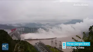 China's Three Gorges project battles record flood peak