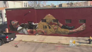 Artists Works To Repair Mural Vandalized In Allston