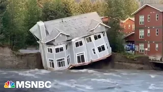 House collapses into river as floods rage from Alaskan glacier