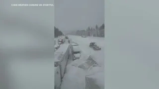 Drone shows Vehicles Stuck on Notorious California Mountain Pass Amid Blizzard