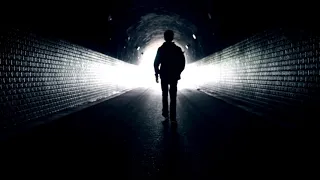 Man walking to light in dark tunnel stock footage#copyrightfree #stockvideo #free