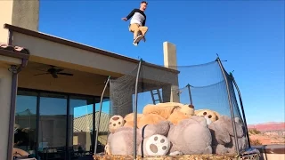 Roof Jumping into Trampoline full of 10 GIANT Teddy Bears!