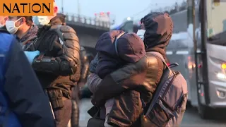 Police evict more than 2,000 migrants from squatter's camp near Paris