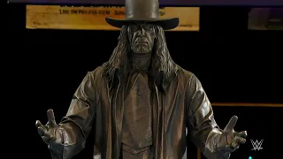 The Undertaker's statue revealed at WrestleMania Axxess
