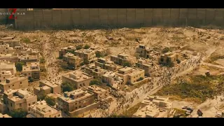 Zumbis pulam o muro Cena do filme Guerra Mundial Z