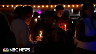 Lewiston residents honor victims of mass shooting during vigil