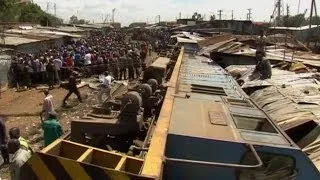 Cargo train comes off the tracks in Africa's largest slum