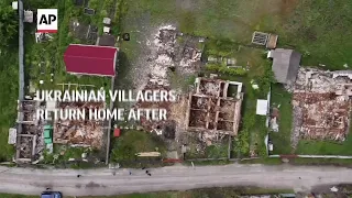 Ukrainian villagers return home after 100 days of war