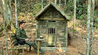 Build a survival shelter using bamboo in the forest, boiled flukes & a wood stove