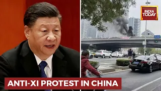 'Remove Dictator & National Traitor Xi Jinping': Protest Banner On Key Beijing Bridge