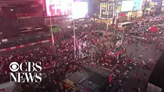 Motorcycle backfiring sparks "shooter" panic in New York's Times Square