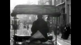 Boston by streetcar, 1903. Boston Elevated Railway trolley and elevated cars.