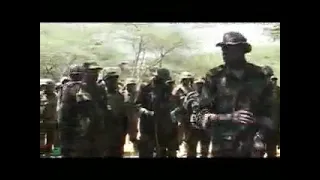 LISTEN. PAUL LOKECH TALKING TO YOUNG SOLDIERS IN SOMALIA.