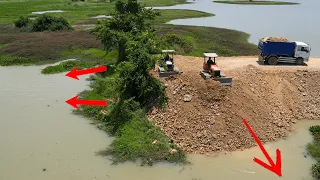 Technical Process Rock 5 Cm Above The Water Dozer Push Land Into Water Truck Move Stone Into Water