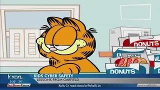 Kids getting a lesson in cyber safety from Garfield