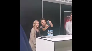 Paul Wesley taking a selfie with a fan