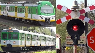 EN57 trains on two vintage railroad crossings in Poland