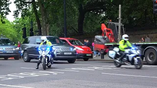 Police escort Prime Minister Boris Johnson around Hyde Park Corner