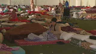 Morrocans displaced by the quake wake up in makeshift shelter in Marrakesh | AFP