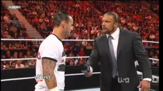 CM Punk's hits Triple H with a pipe bomb after mic cutoffs