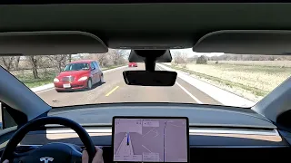 Taking FSD v12 a spin in my Tesla Model Y on a very windy day