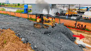Exellent work !! CAT Bulldozer pushing rock to build a road.