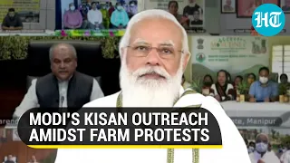 PM Modi talks to farmers, releases PM-KISAN instalment as Opposition backs anti-farm law stir