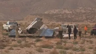 Federal investigators search for clues into Virgin Galactic crash