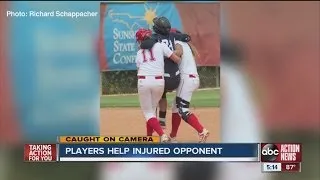 Players help injured opponent