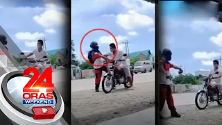 Nauwi sa sagutan ang pagsita ng isang traffic enforcer sa motorycle rider... | 24 Oras Weekend