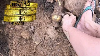 I FOUND THIS ARTIFACTS UNDER THIS ROCKS FORMATION WITH  GOLD BARS.