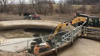 Digging & spreading sand laden manure