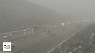 Snow falls on Grapevine as cold storm passes through Southern California