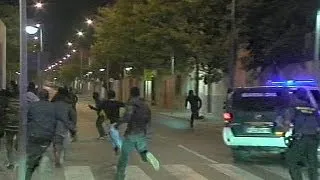 African migrants storm Spanish border fence
