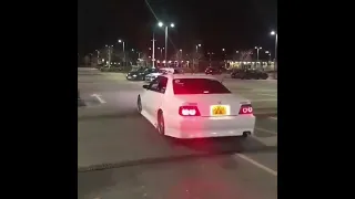 Tuned Audi S4 wagon and Toyota Chaser leaving a car meet