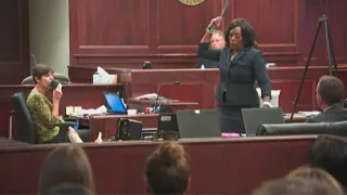 Prosecutor Dasha Young punctuates her closing statement with a belt