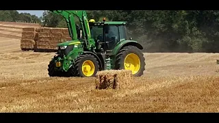 Filming farmers collecting bales.