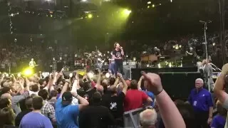 Ed reacts to a fan with a sign that reads "Alive saved my life"