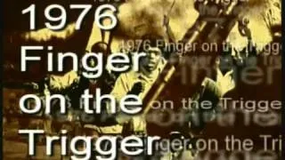 1976 Finger on the trigger