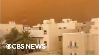 Kuwait's skies turn orange in dust storm