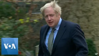 Britain's Johnson Returns to Downing Street after Meeting Queen