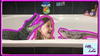 Crocodile and lizard in tne bath Крокодил и ящерица в ванной откладывают яйца