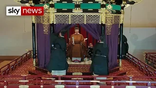 Japan's Emperor Naruhito ascends to throne in ancient ceremony