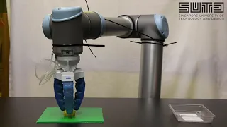 Pneumatically actuated soft gripper picking up fruit slices