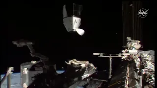 SpaceX Crew Dragon spacecraft re-docks with space station after changing ports