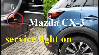 Service light on - Mazda CX-3  - Almost a year gone. How can I reset the service light?