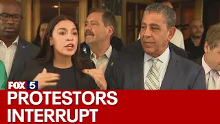 NYC migrant crisis: AOC interrupted by protesters at Roosevelt Hotel