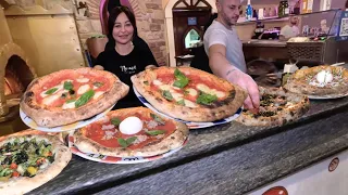 The Queen of Pizza! She makes magnificent pizzas with her team. Pizzeria "Nennè Pizza" Turin, Italy.