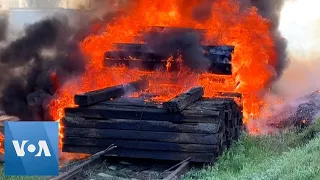 Railroad Car Engulfed in Flames After Shelling in Lyman, Ukraine